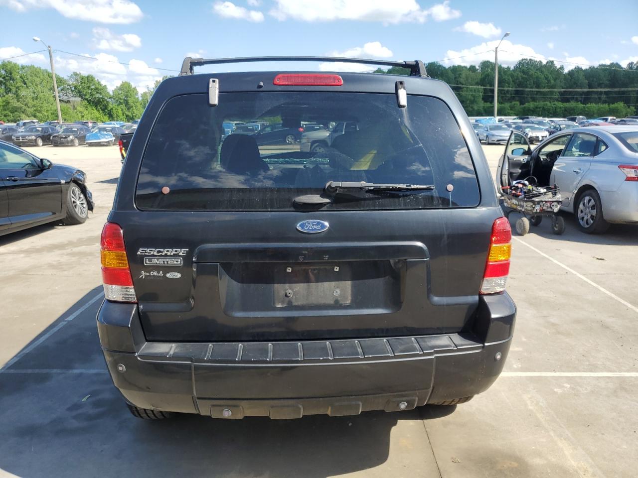 2005 Ford Escape Limited VIN: 1FMCU04105KA65104 Lot: 56709875