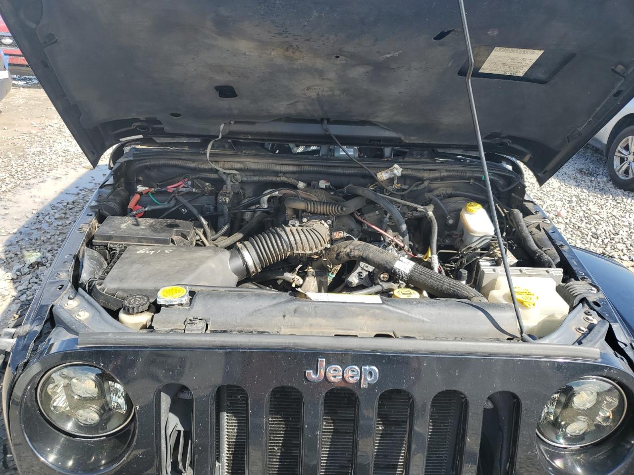 2007 Jeep Wrangler Sahara VIN: 1J8FA54137L209032 Lot: 56502475