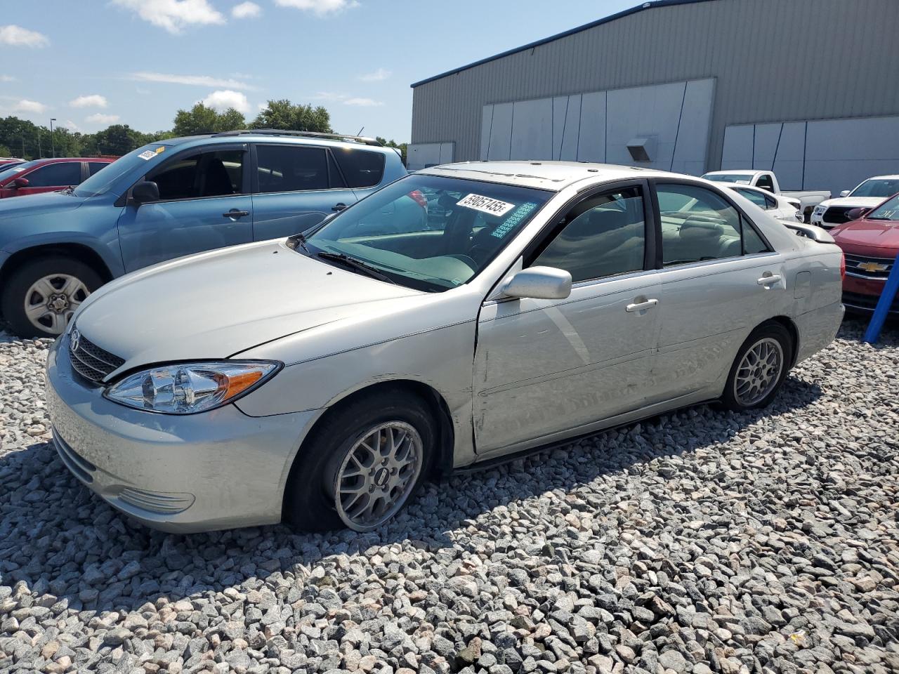 2003 Toyota Camry Le zu verkaufen in Apopka, FL - All Over