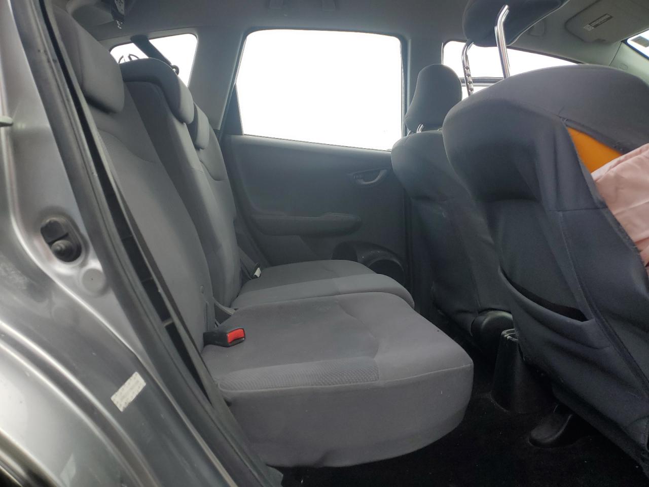 2009 Honda Fit VIN: JHMGE87299S003596 Lot: 56874375