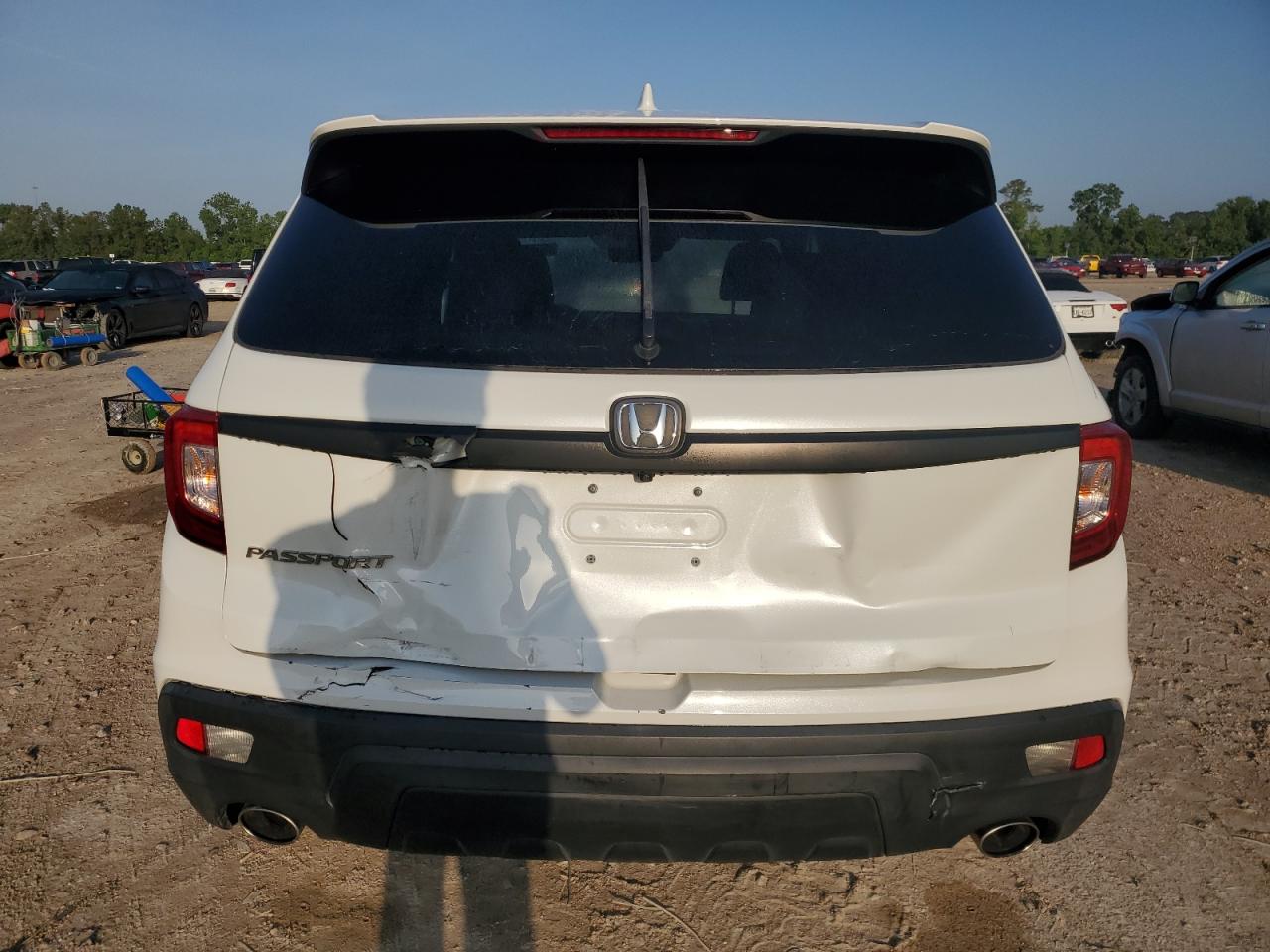 2021 Honda Passport Exl VIN: 5FNYF7H53MB010829 Lot: 56399175