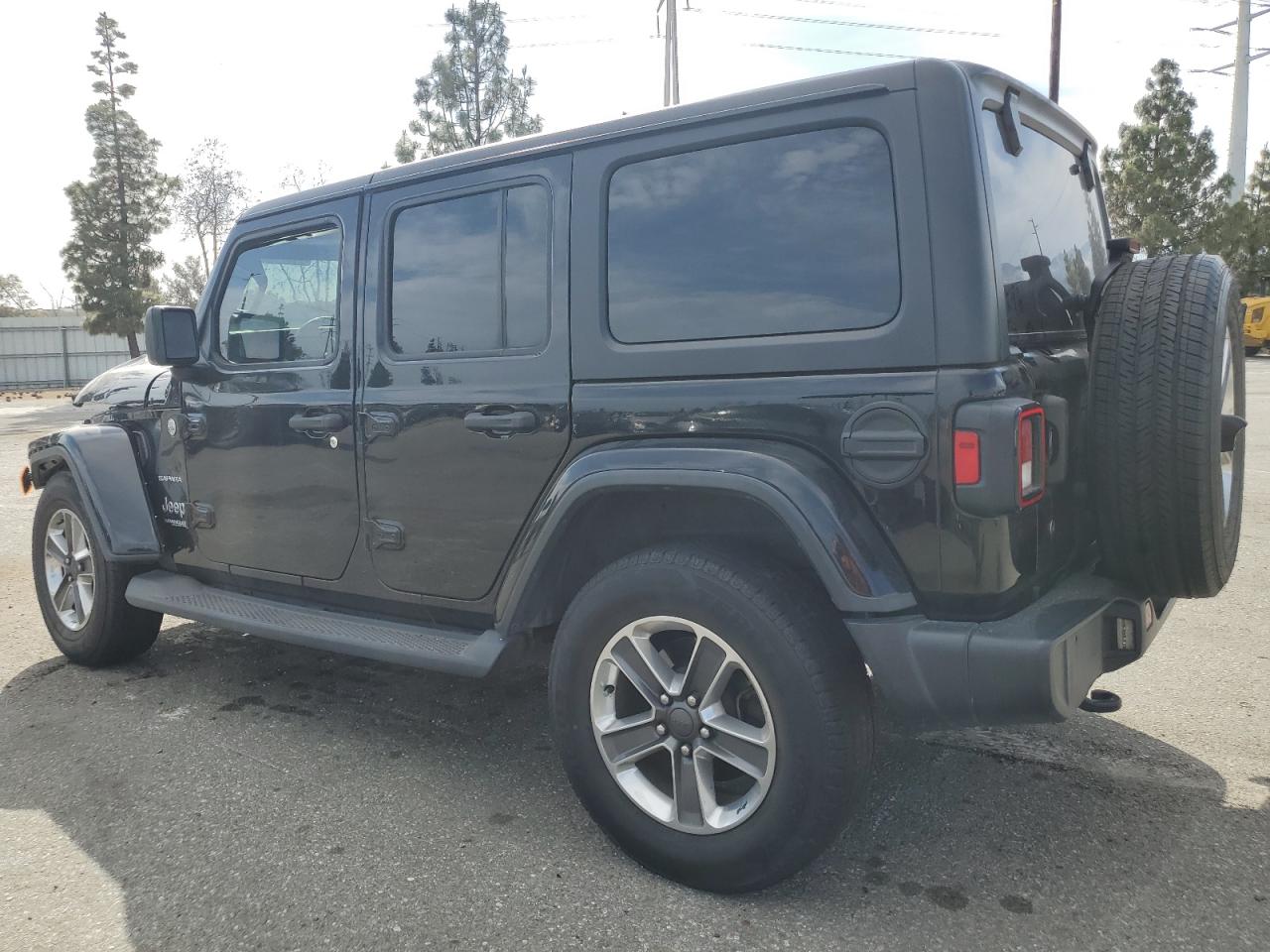 2019 Jeep Wrangler Unlimited Sahara VIN: 1C4HJXENXKW590186 Lot: 56775165