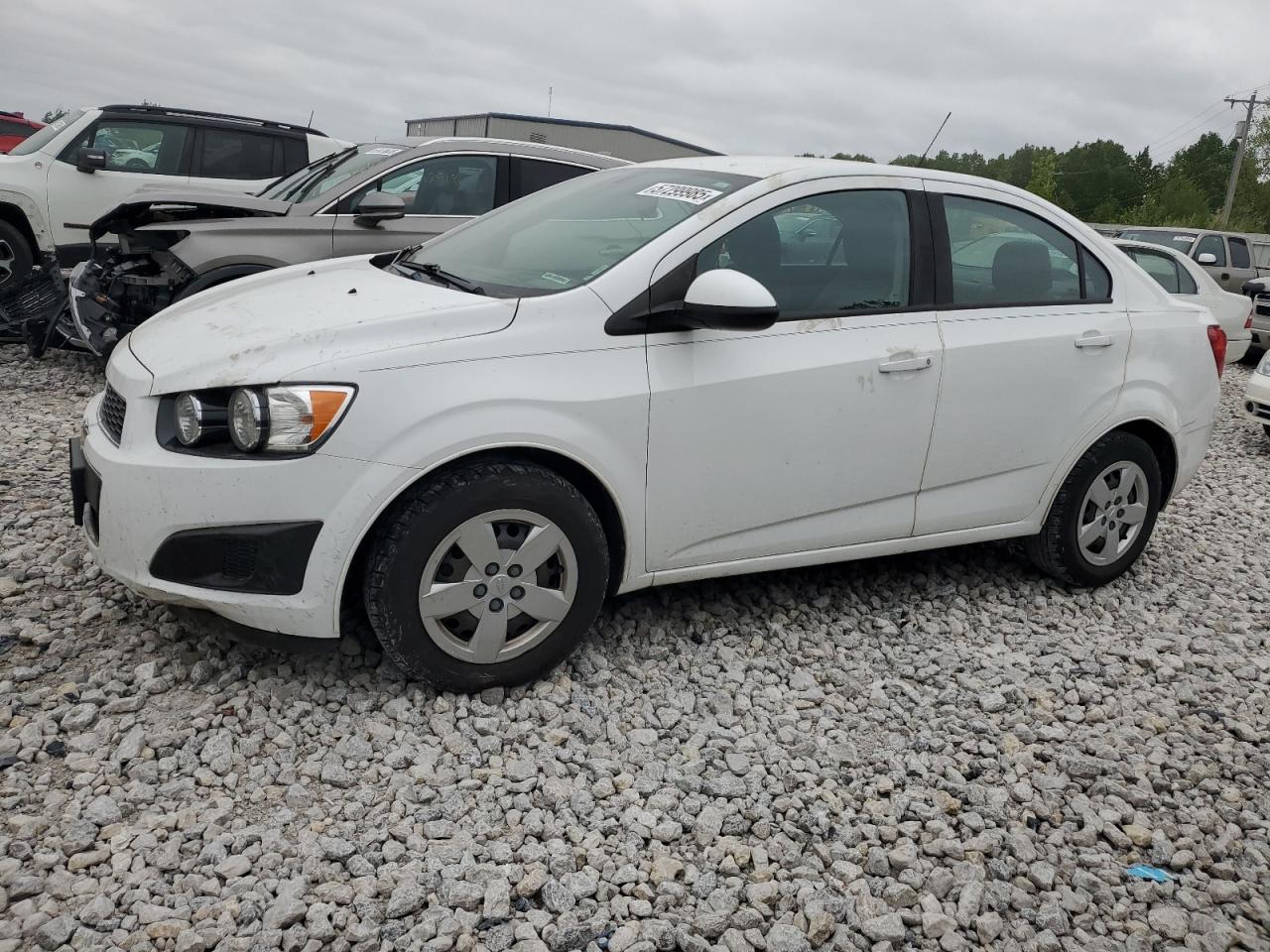 2015 Chevrolet Sonic Ls продається в Wayland, MI - Side