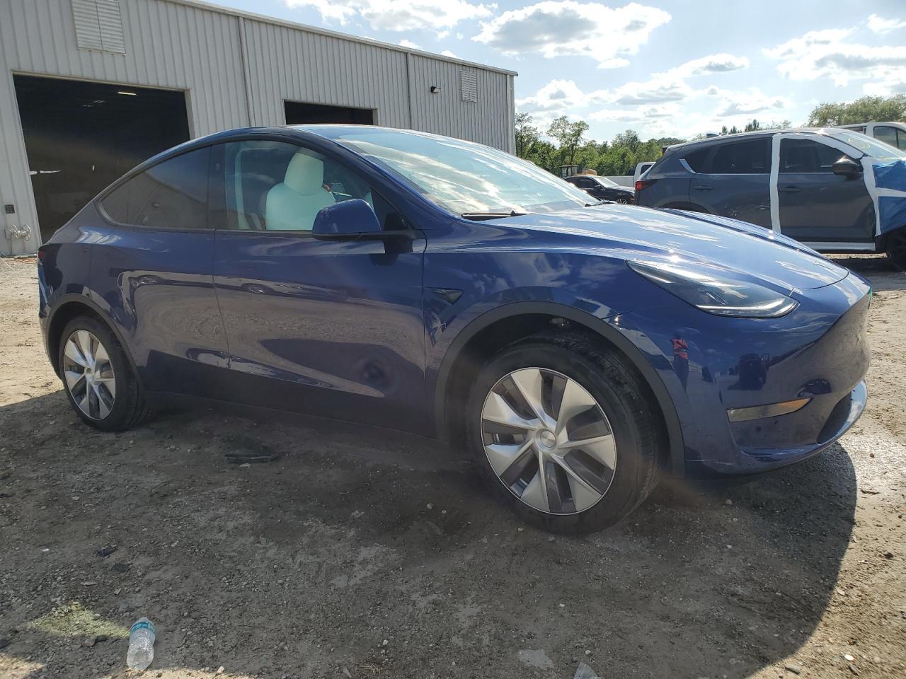 2023 Tesla Model Y VIN: 7SAYGDEE3PA178832 Lot: 57156005