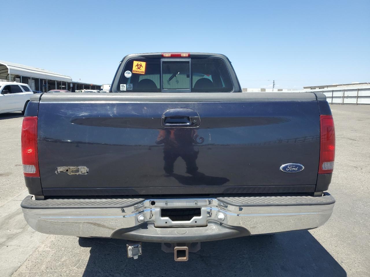 1999 Ford F150 VIN: 1FTRX18L0XKB77329 Lot: 56355145