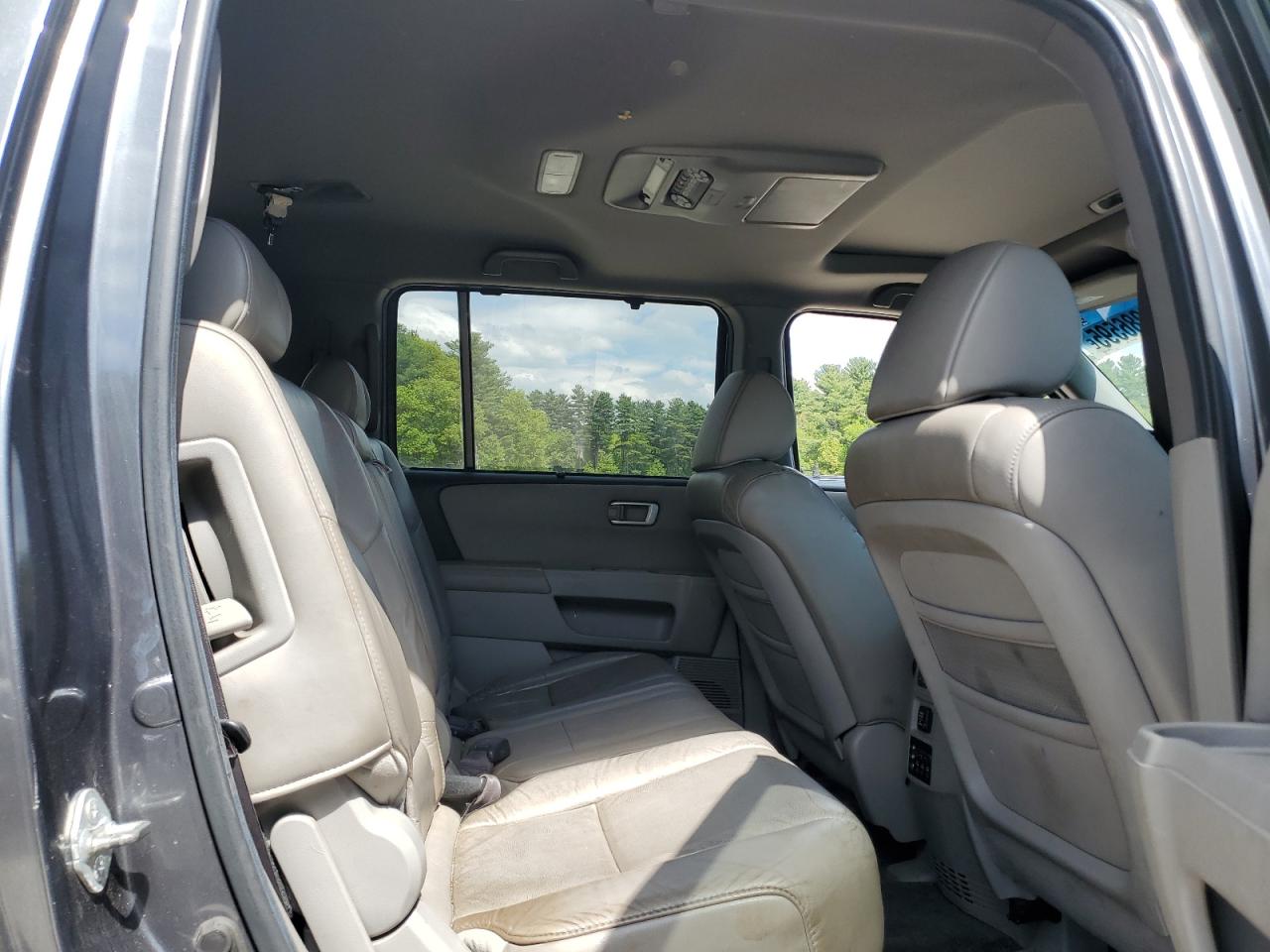 2011 Honda Pilot Touring VIN: 5FNYF4H91BB104027 Lot: 56286595