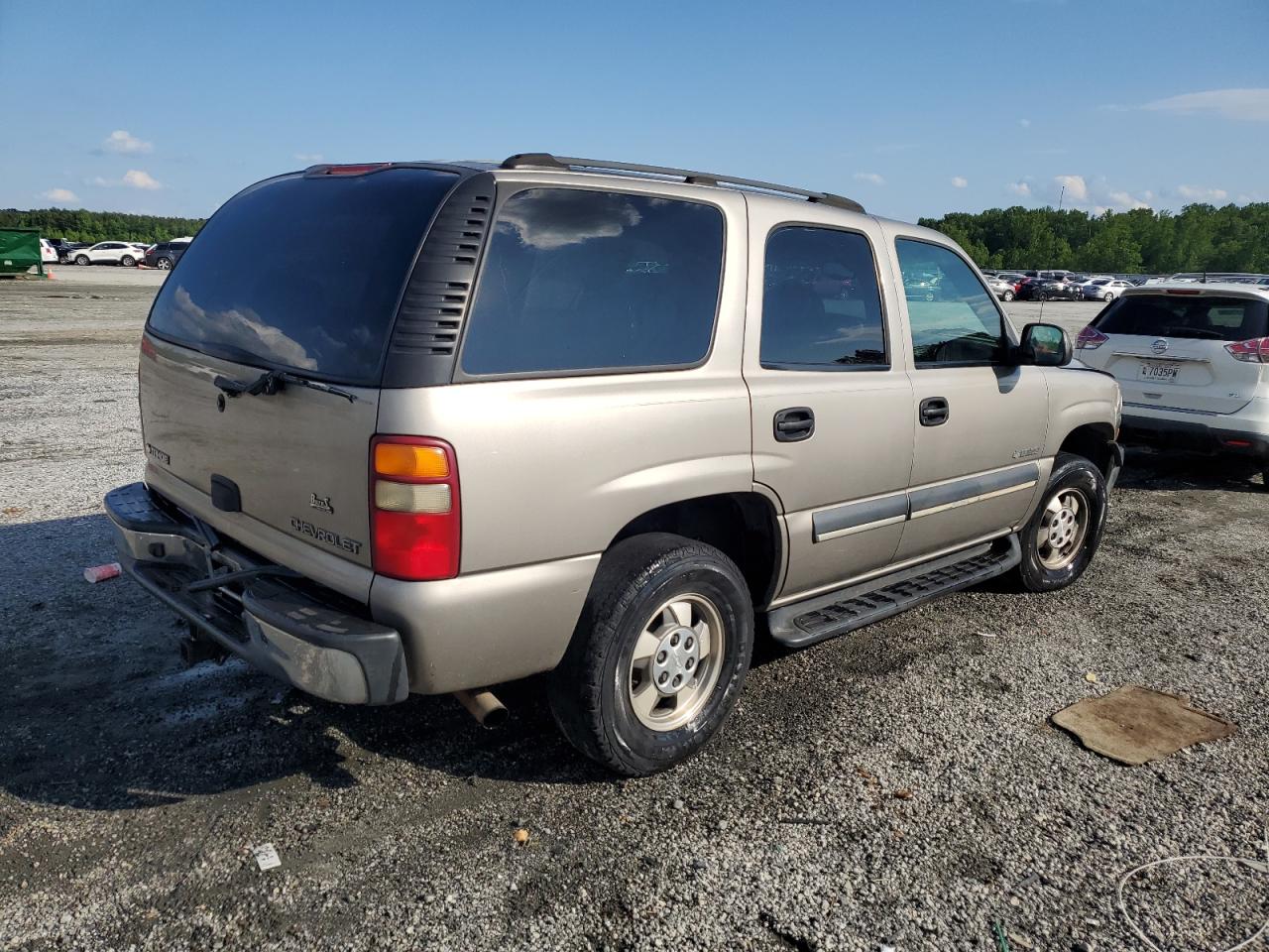 2003 Chevrolet Tahoe C1500 VIN: 1GNEC13ZX3R250768 Lot: 56576895
