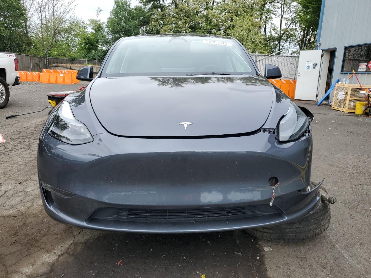2023 Tesla Model Y VIN: 7SAYGDEE3PF870754 Lot: 56991315