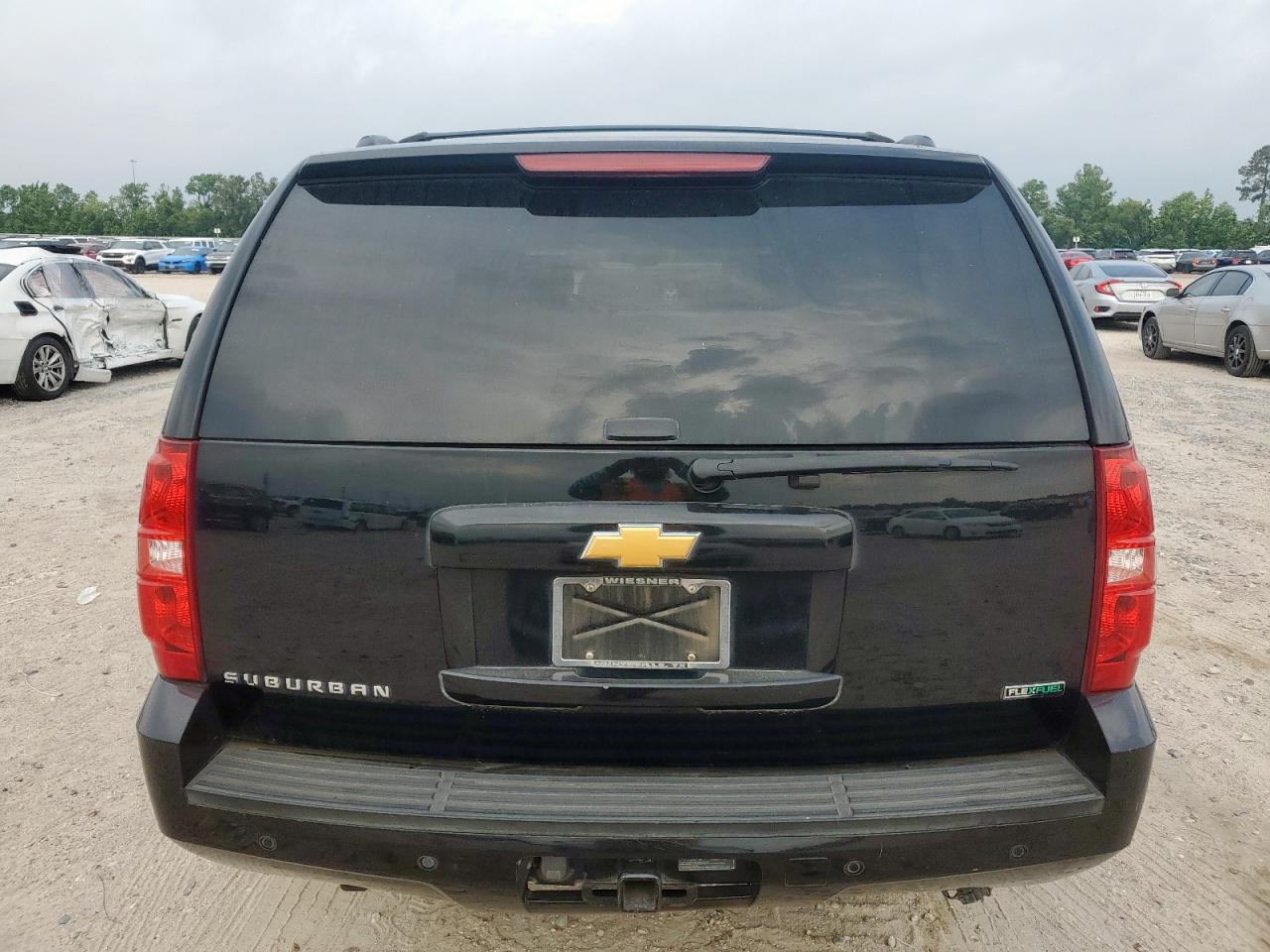 2012 Chevrolet Suburban C1500 Lt VIN: 1GNSCJE01CR325049 Lot: 56212525