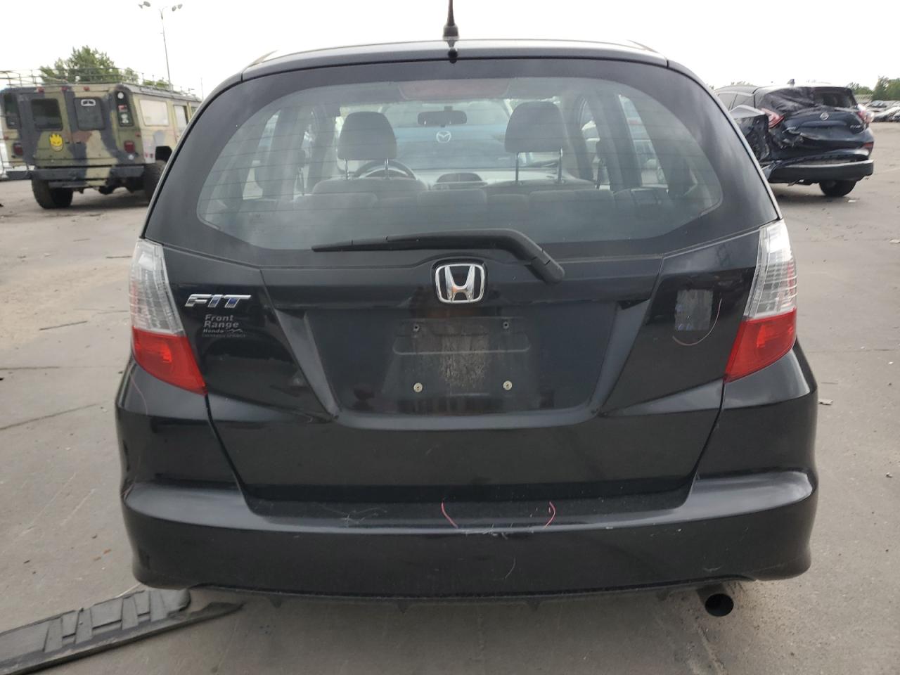 2012 Honda Fit VIN: JHMGE8G39CC032090 Lot: 57880775