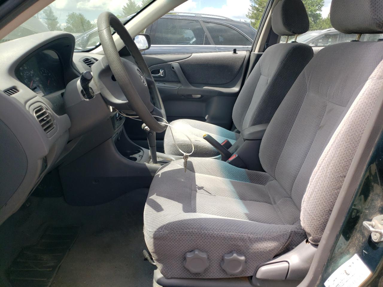 2000 Mazda Protege Dx VIN: JM1BJ2229Y0214674 Lot: 56354685