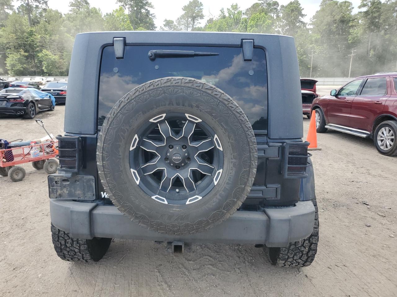 2007 Jeep Wrangler Sahara VIN: 1J4GB59107L215687 Lot: 58335215