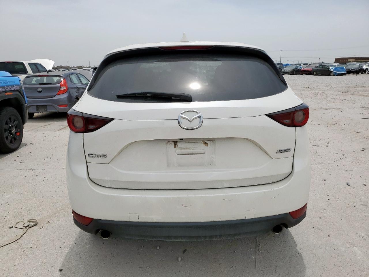 2019 Mazda Cx-5 Touring VIN: JM3KFACM7K0522100 Lot: 56693595