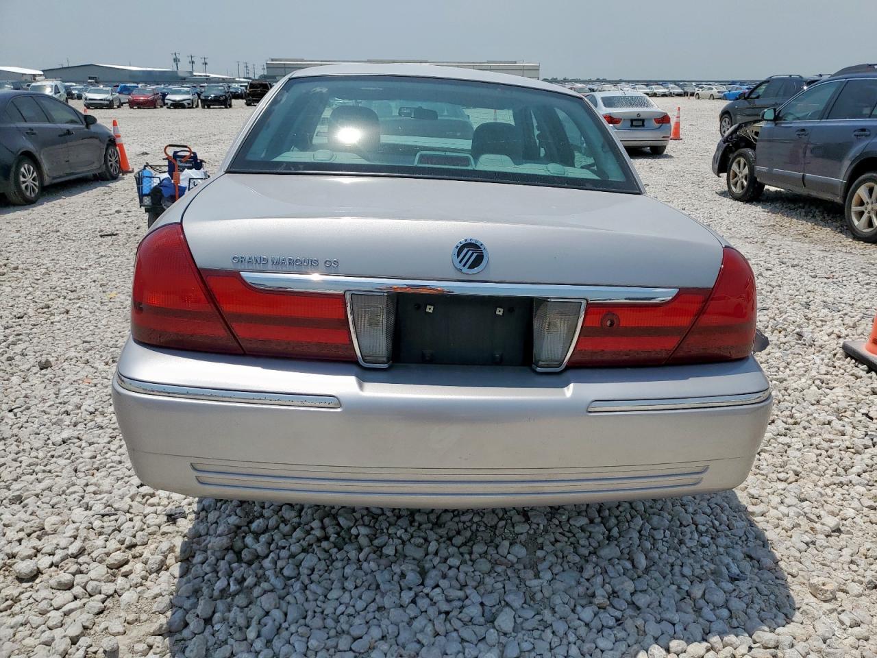 2004 Mercury Grand Marquis Gs VIN: 2MEFM74W94X683389 Lot: 57091975