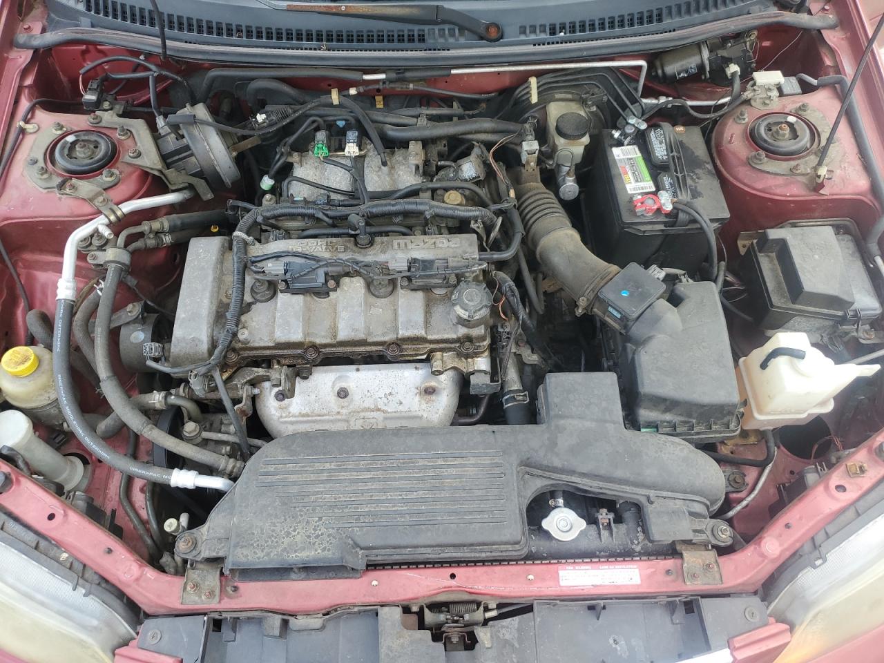 2002 Mazda Protege Dx VIN: JM1BJ225521564900 Lot: 56835065