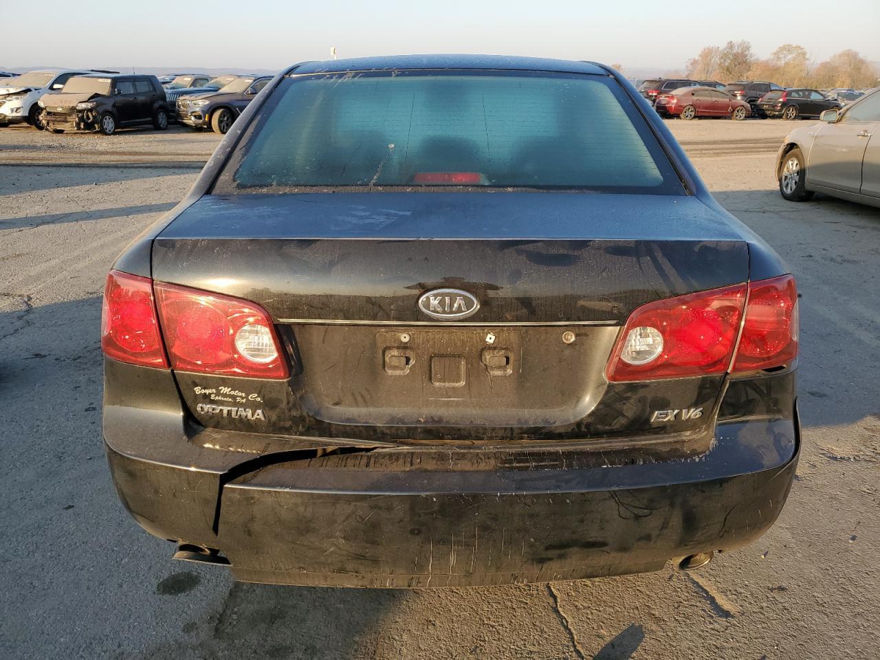 2006 Kia Optima Lx VIN: KNAGE124765074224 Lot: 55917675