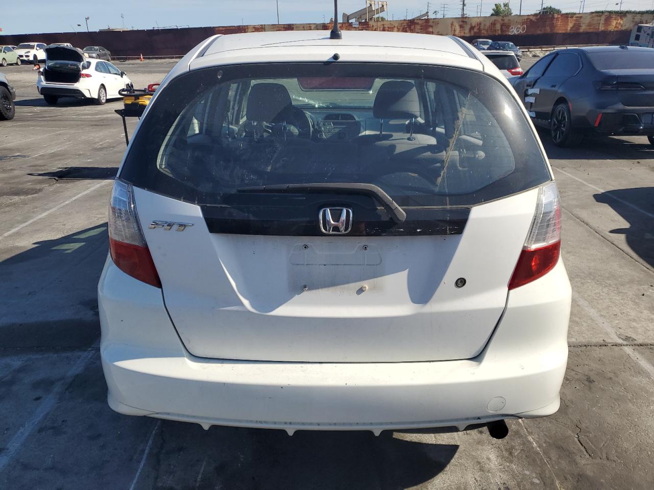 2009 Honda Fit VIN: JHMGE87209S045364 Lot: 57136955