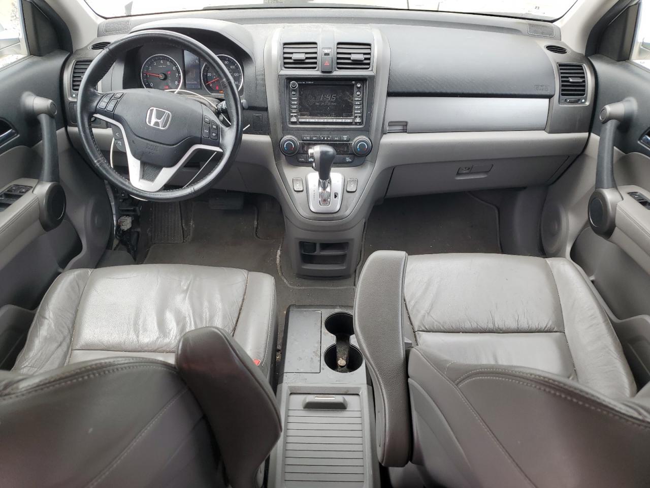 2010 Honda Cr-V Exl VIN: JHLRE4H7XAC004674 Lot: 56661425