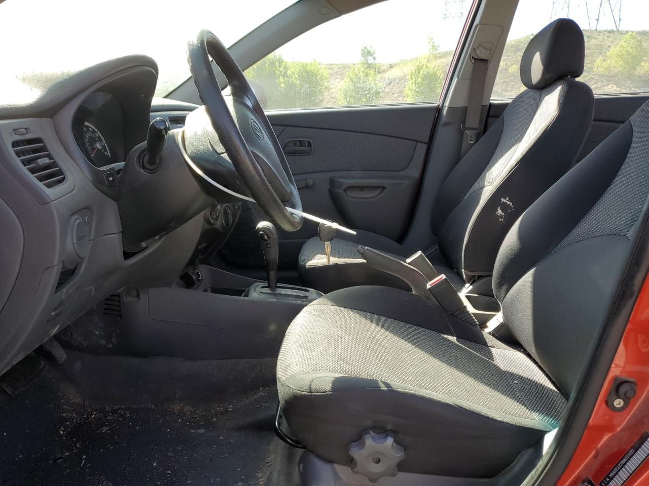 2009 Kia Rio Base VIN: KNADE223396551021 Lot: 57317895