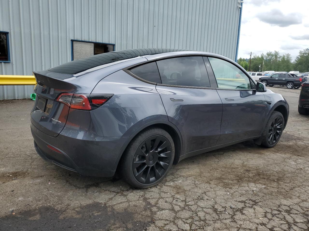 2023 Tesla Model Y VIN: 7SAYGDEE3PF870754 Lot: 56991315