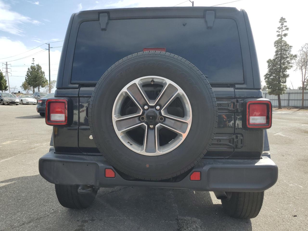 2019 Jeep Wrangler Unlimited Sahara VIN: 1C4HJXENXKW590186 Lot: 56775165