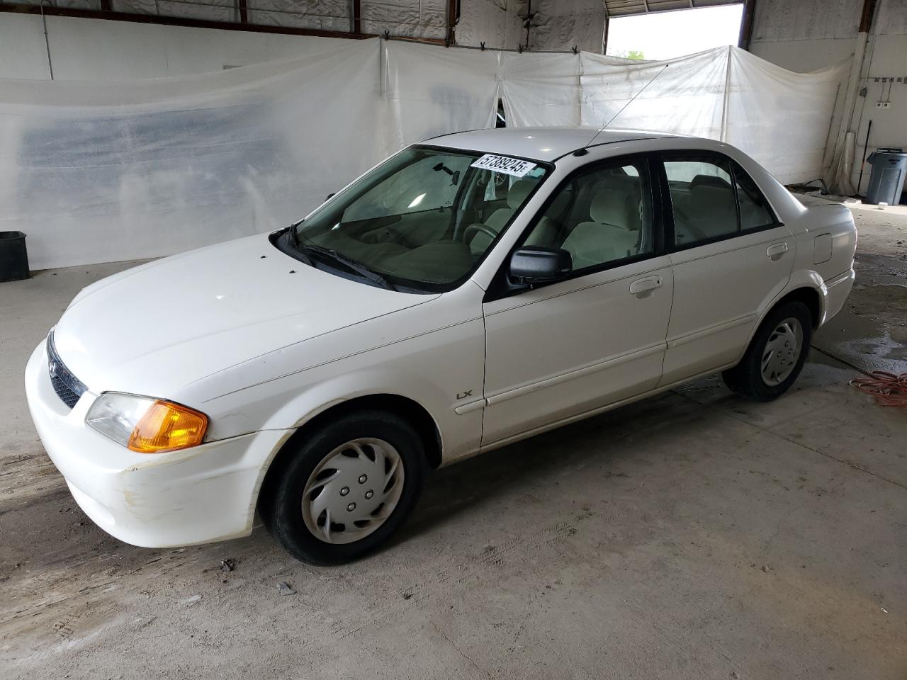 1999 Mazda Protege Dx للبيع في Lexington، KY - Front End