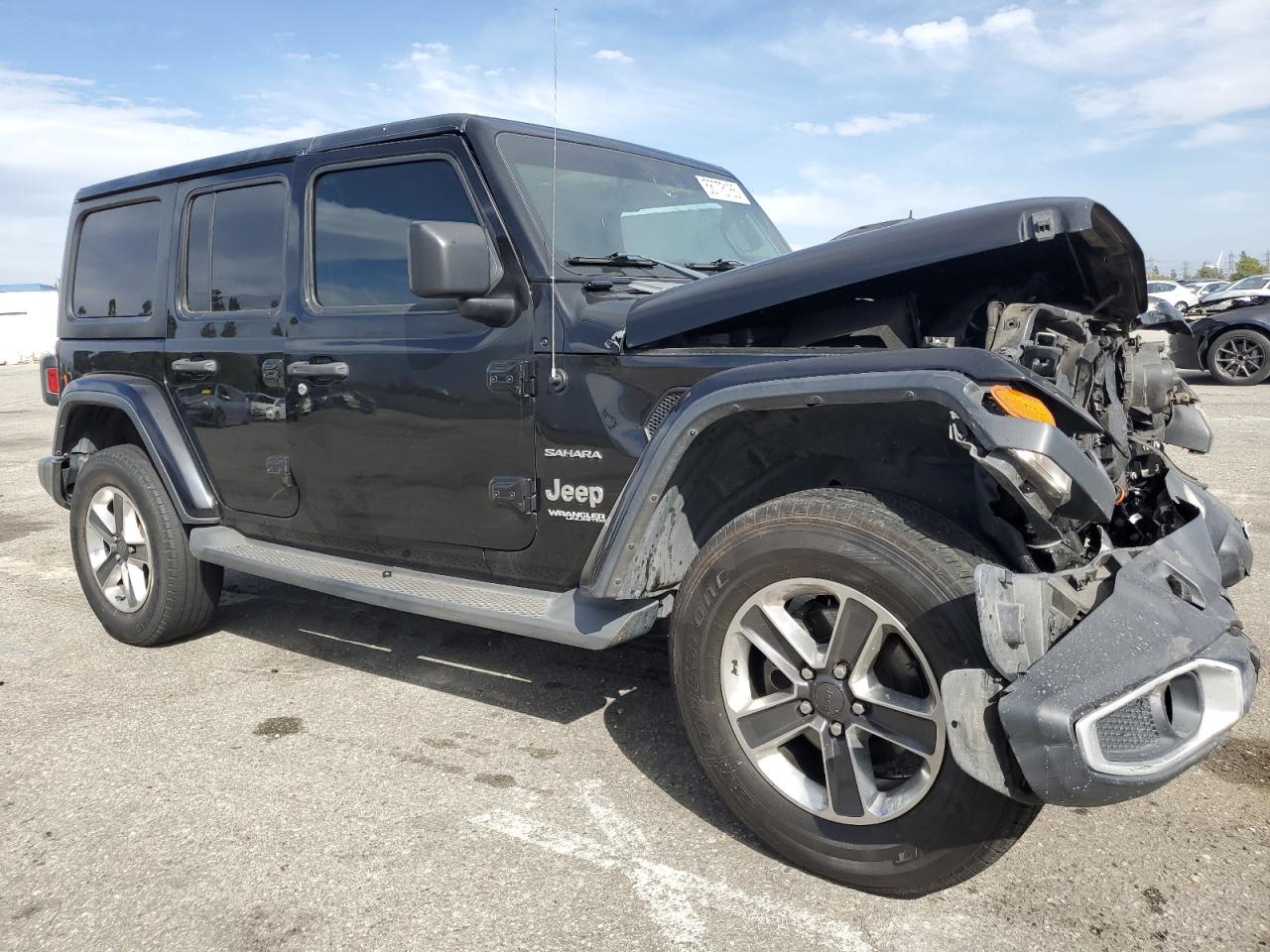 2019 Jeep Wrangler Unlimited Sahara VIN: 1C4HJXENXKW590186 Lot: 56775165