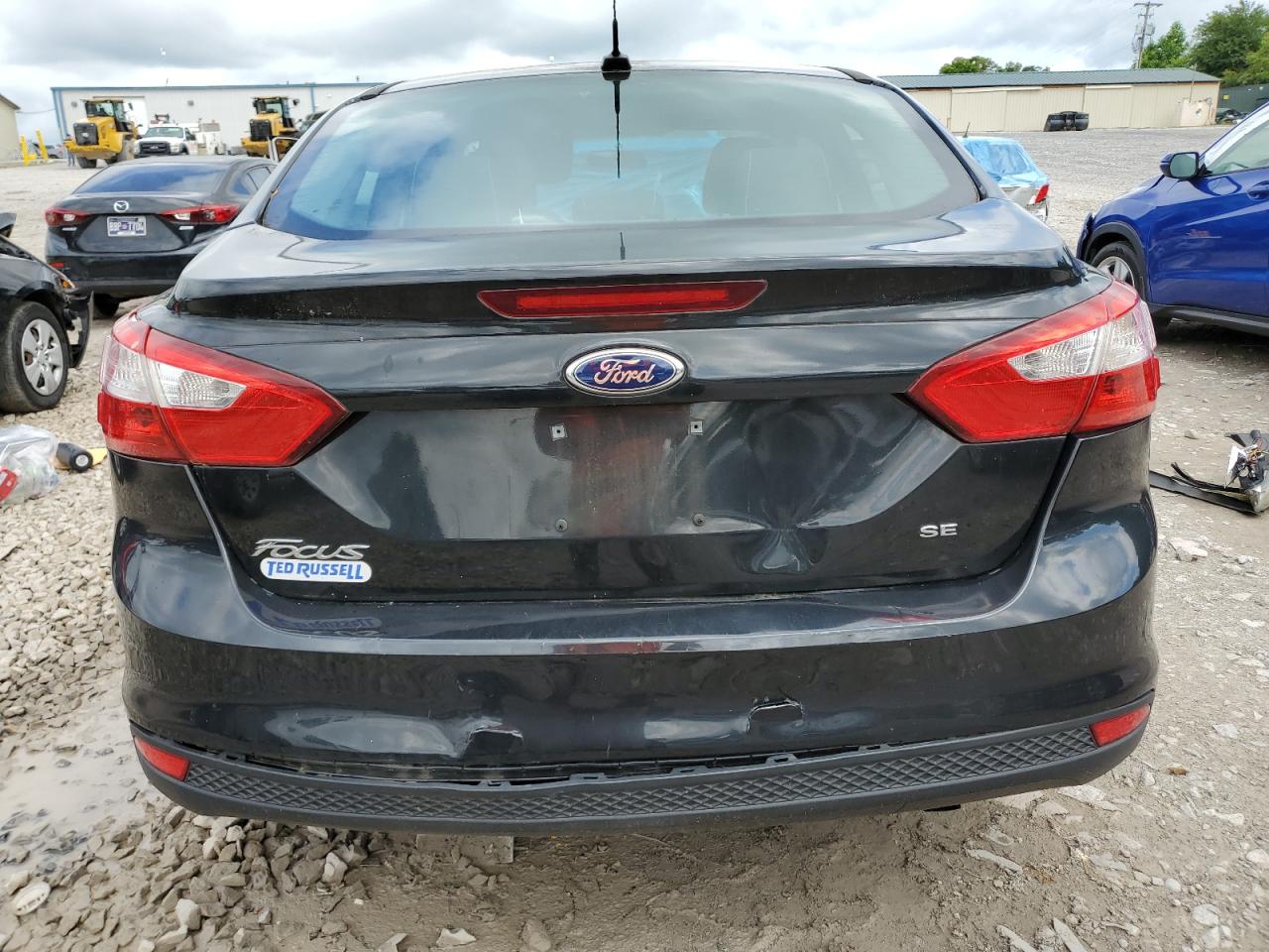 2014 Ford Focus Se VIN: 1FADP3F21EL318471 Lot: 56875565