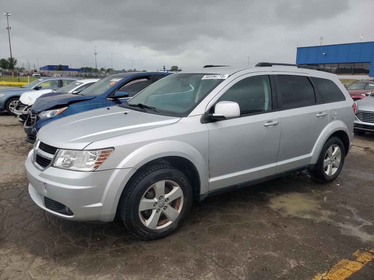 2010 Dodge Journey Sxt للبيع في Woodhaven، MI - Side
