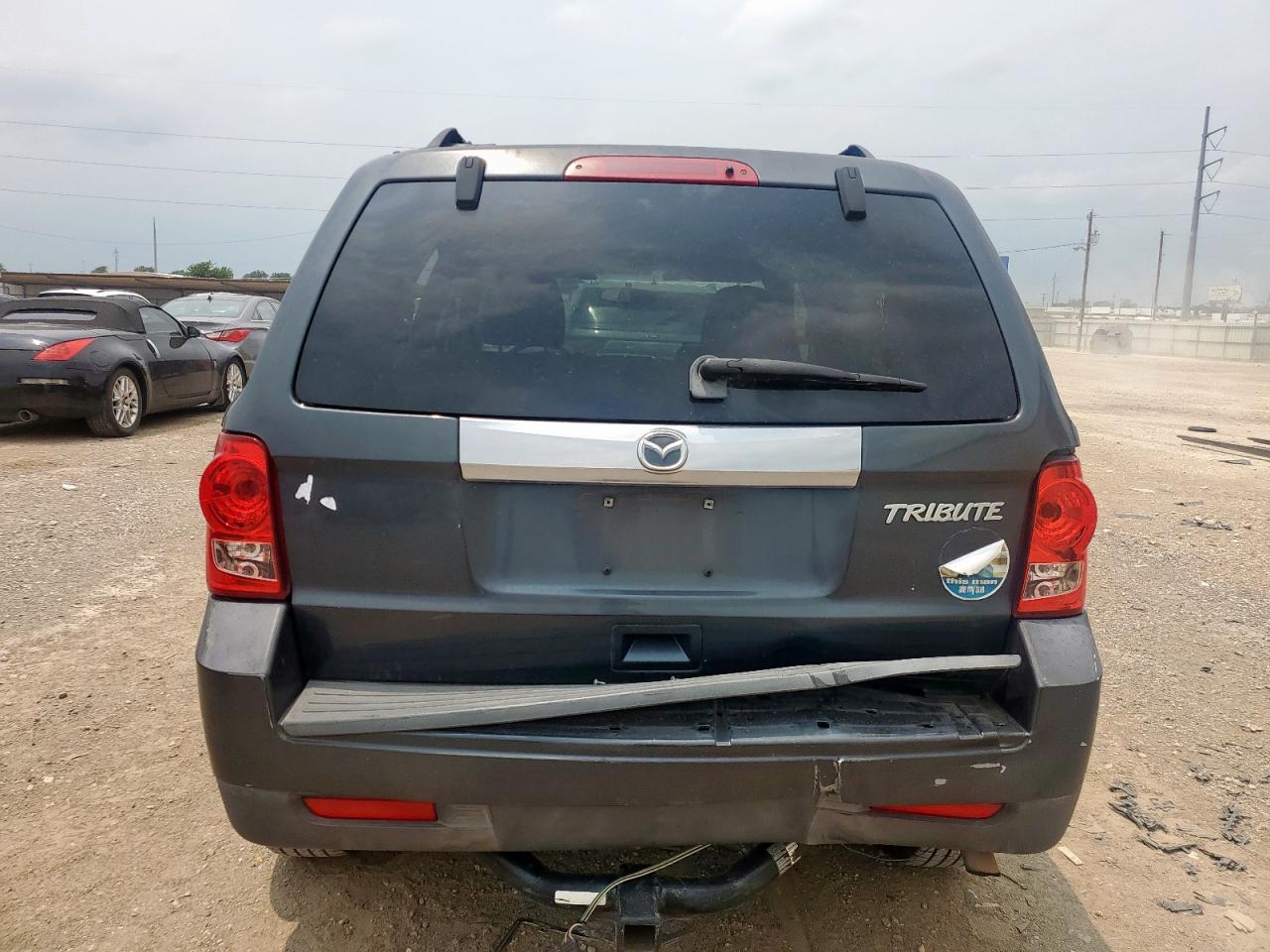 2010 Mazda Tribute I VIN: 4F2CY0C79AKM05519 Lot: 57524665