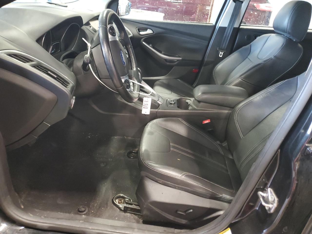 2014 Ford Focus Titanium VIN: 1FADP3N20EL457251 Lot: 56785315
