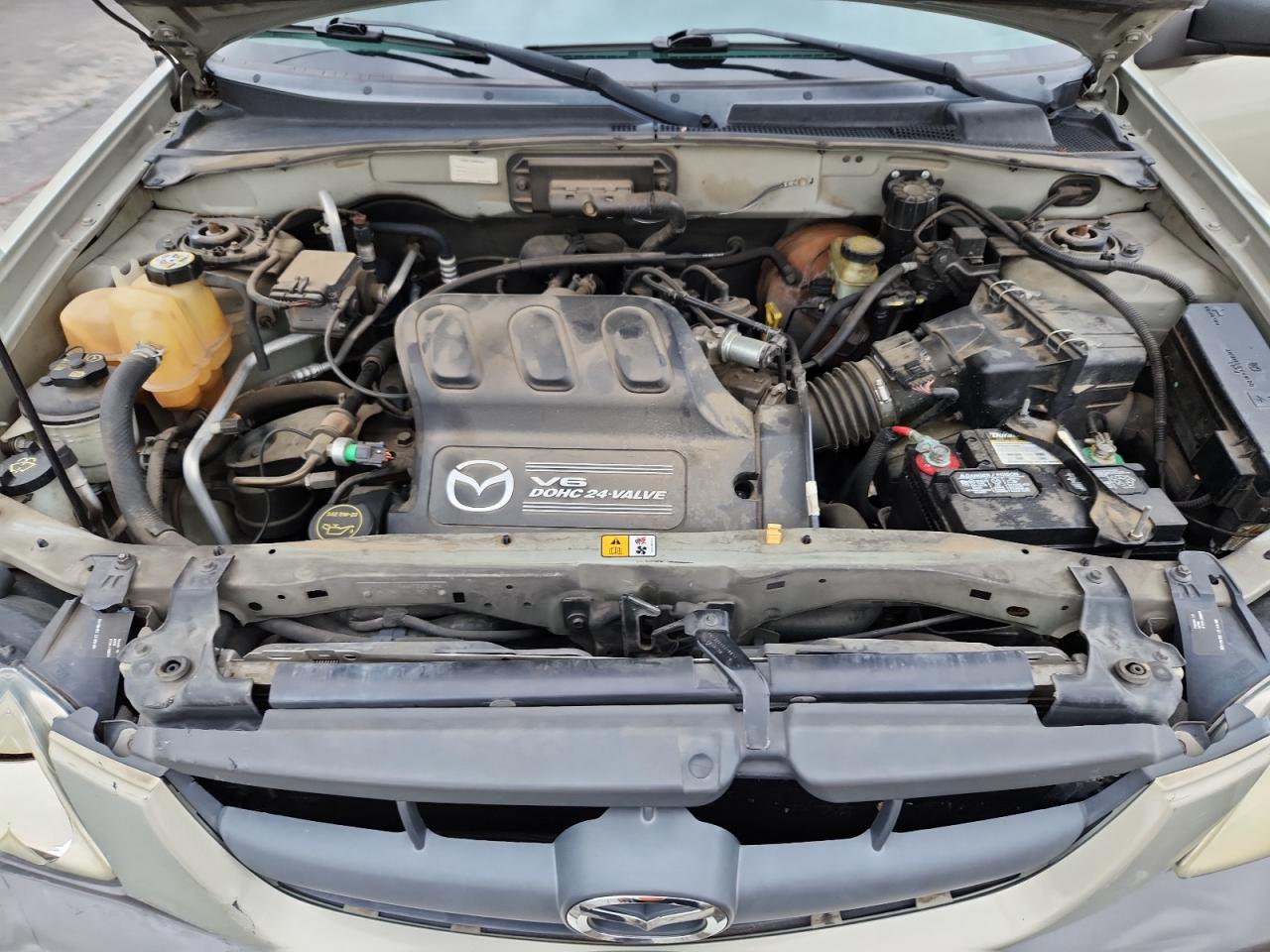 2004 Mazda Tribute Lx VIN: 4F2YZ04164KM12932 Lot: 58793955