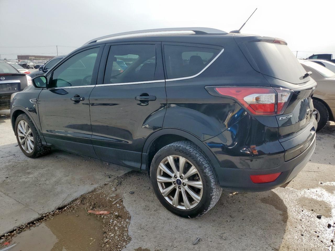 2017 Ford Escape Titanium VIN: 1FMCU0JD9HUB06238 Lot: 56900025