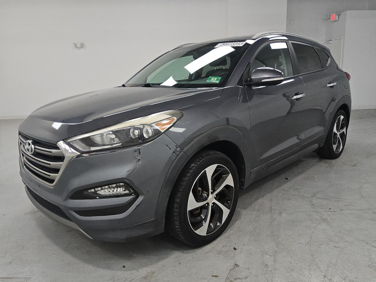 KM8J3CA20GU166739 HYUNDAI TUCSON Photo 1