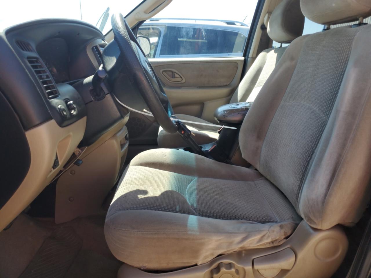 2003 Mazda Tribute Lx VIN: 4F2YZ04103KM08910 Lot: 57285715