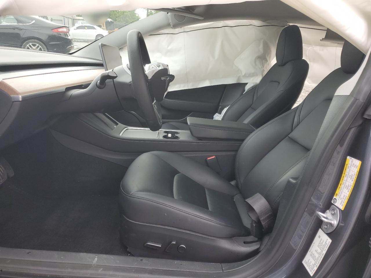 2023 Tesla Model 3 VIN: 5YJ3E1EA1PF677883 Lot: 58949005