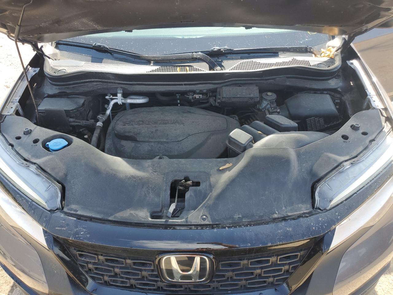 2021 Honda Passport Touring VIN: 5FNYF8H92MB038999 Lot: 56714365