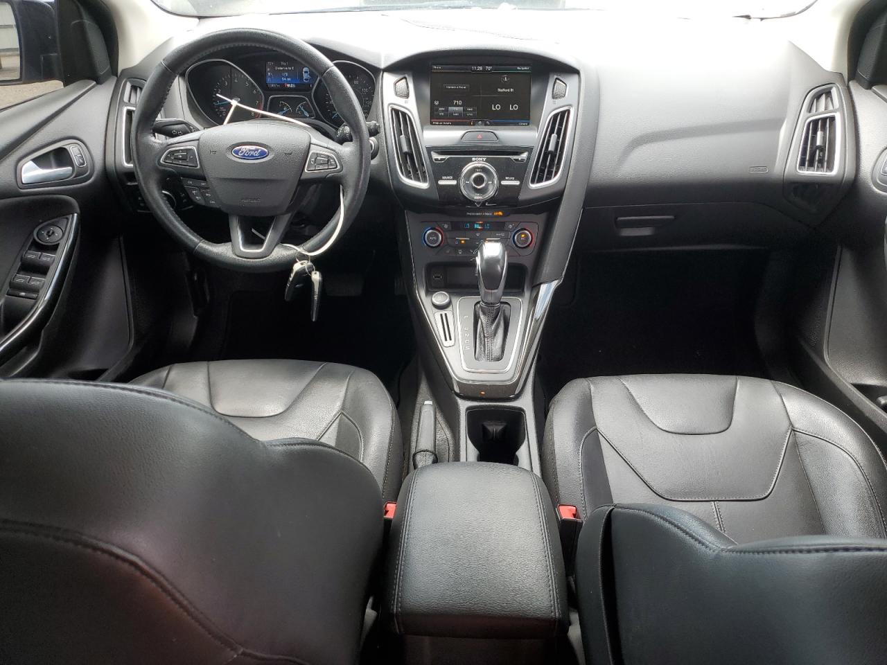 2015 Ford Focus Titanium VIN: 1FADP3N20FL232314 Lot: 56893515