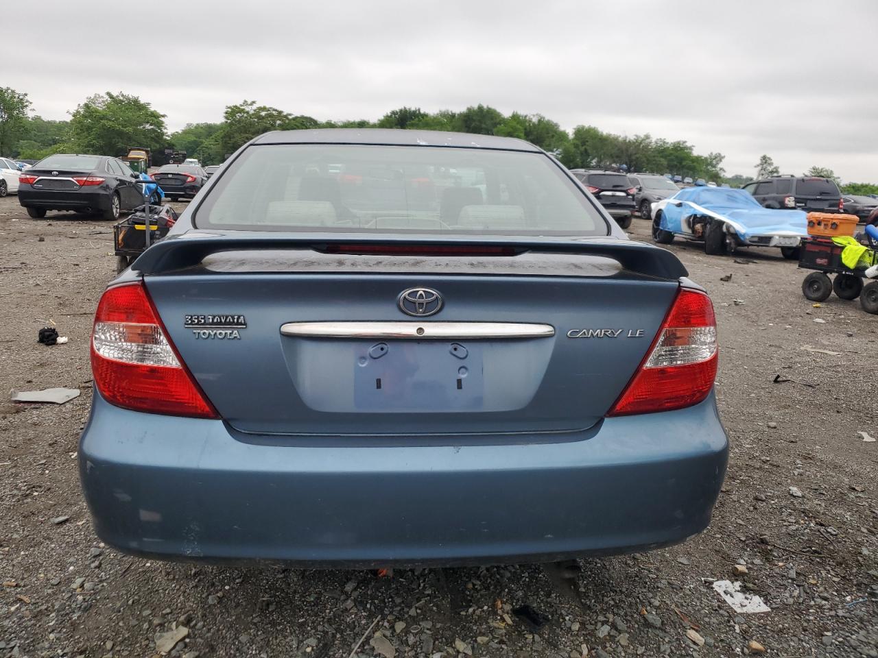 2002 Toyota Camry Le VIN: 4T1BE32K32U578286 Lot: 57104045