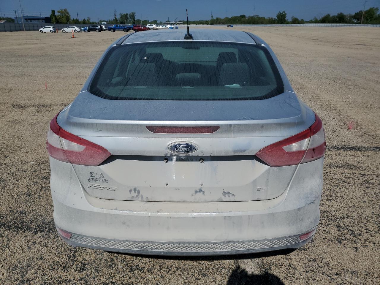 2012 Ford Focus Se VIN: 1FAHP3F22CL323466 Lot: 57051925
