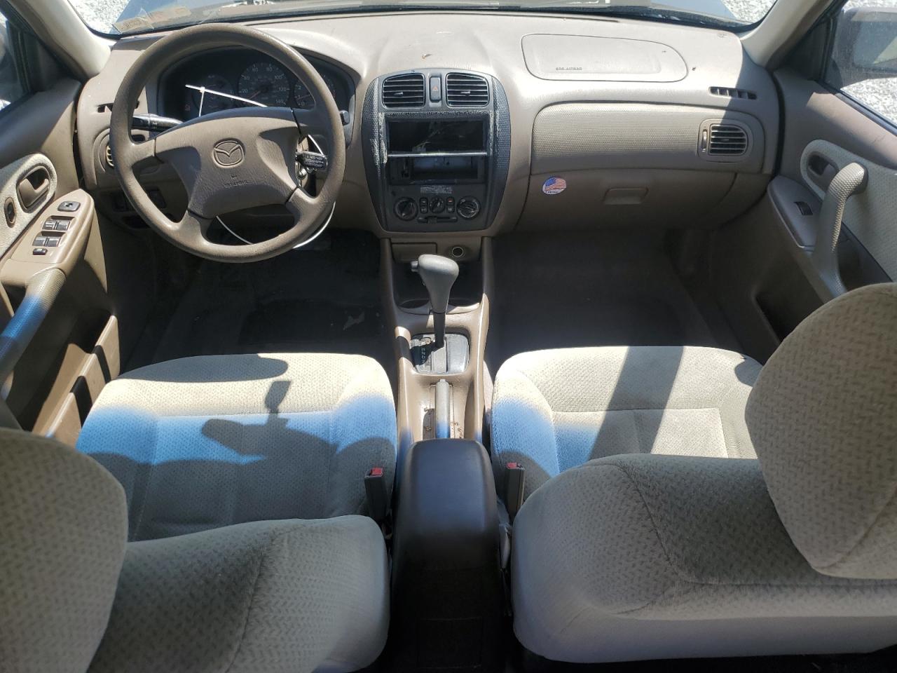 1999 Mazda Protege Dx VIN: JM1BJ2229X0137724 Lot: 55149115