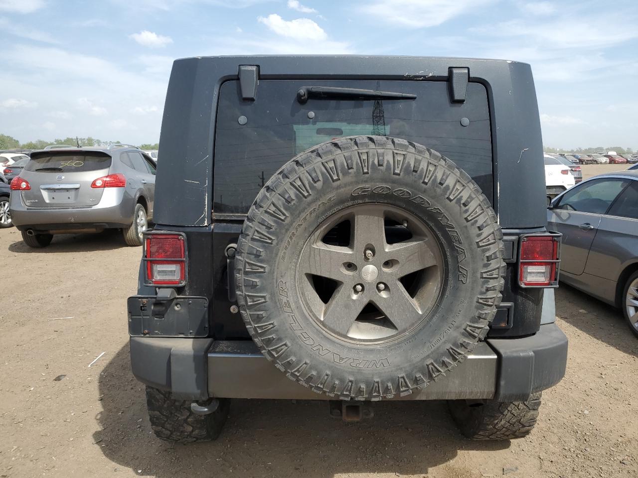 2010 Jeep Wrangler Unlimited Sport VIN: 1J4BA3H16AL225389 Lot: 57000925