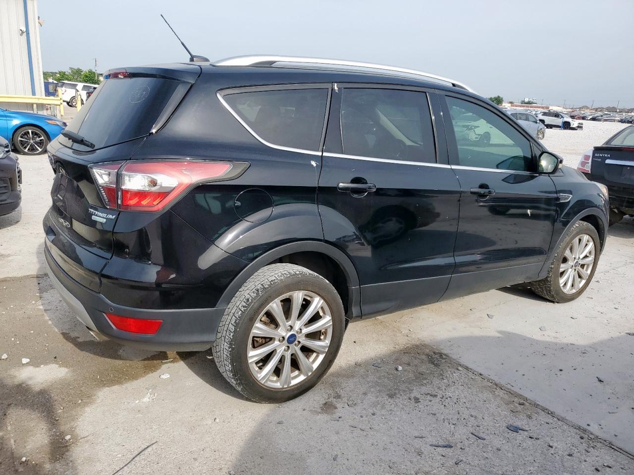 2017 Ford Escape Titanium VIN: 1FMCU0JD9HUB06238 Lot: 56900025