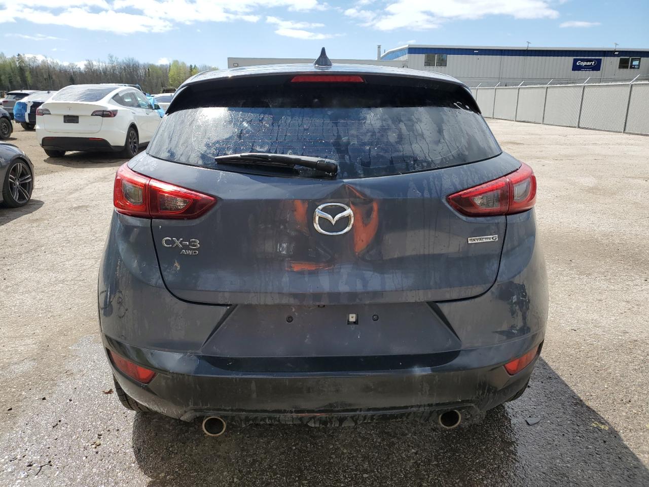 2021 Mazda Cx-3 Touring VIN: JM1DKFC79M1504702 Lot: 56072725