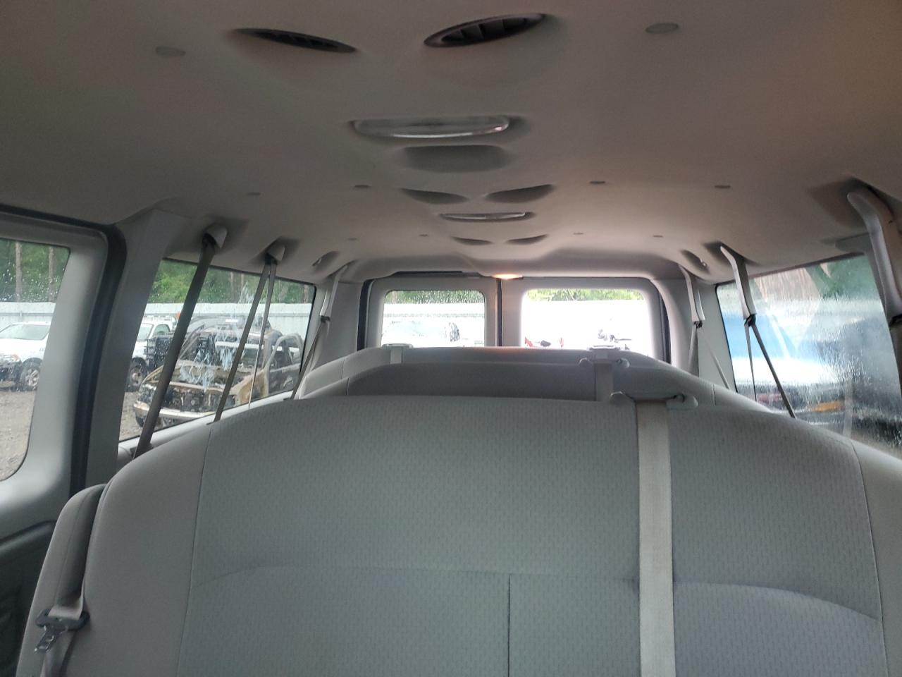2009 Ford Econoline E350 Super Duty Wagon VIN: 1FBNE31L49DA74498 Lot: 56381945