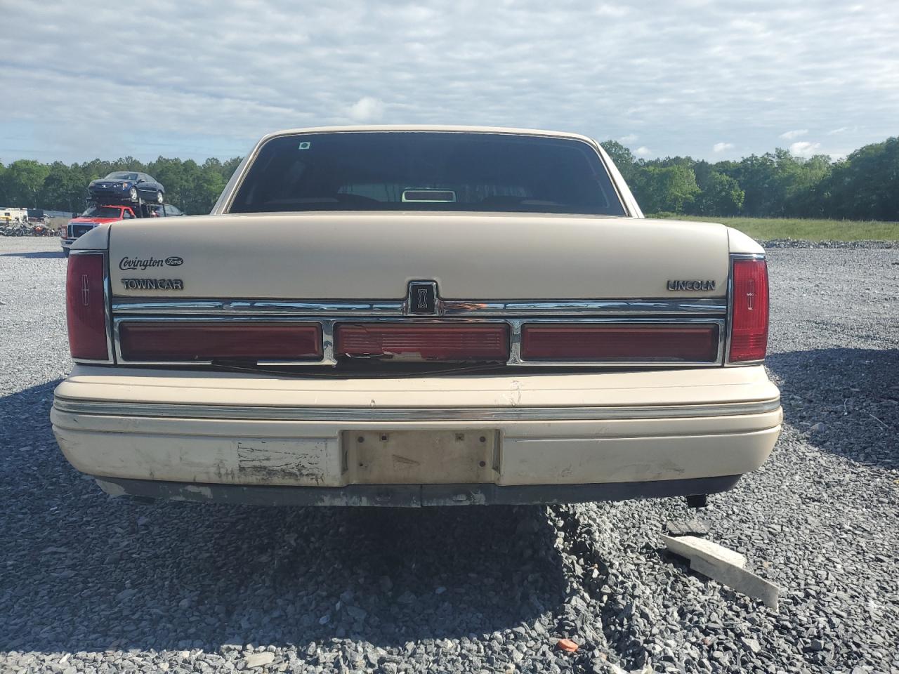 1995 Lincoln Town Car Cartier VIN: 1LNLM83WXSY703833 Lot: 54531675