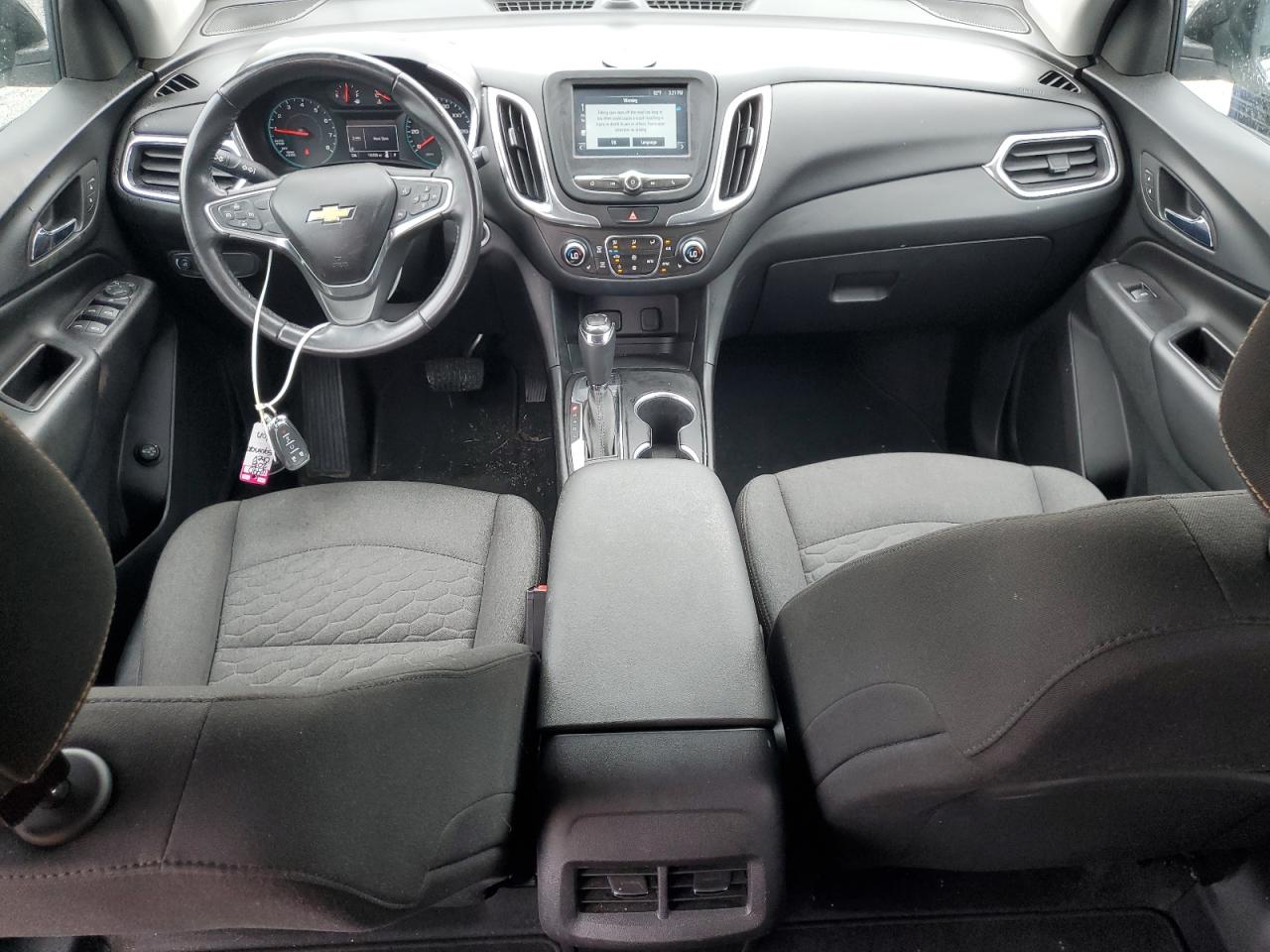 2018 Chevrolet Equinox Lt VIN: 2GNAXSEV5J6334735 Lot: 57116005