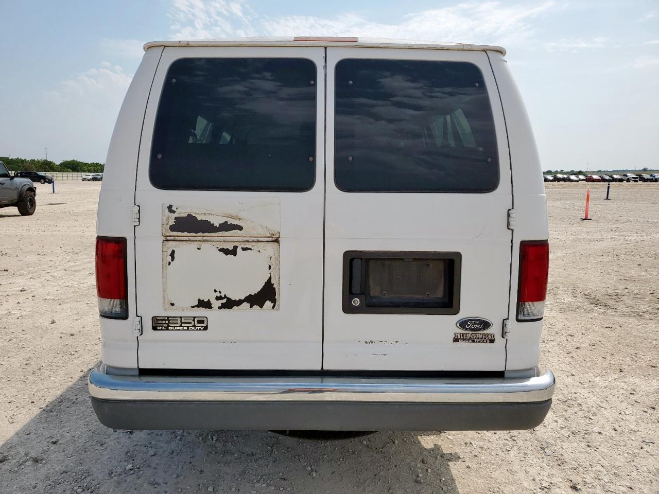 2001 Ford Econoline E350 Super Duty Wagon VIN: 1FBSS31L51HA84594 Lot: 56895355