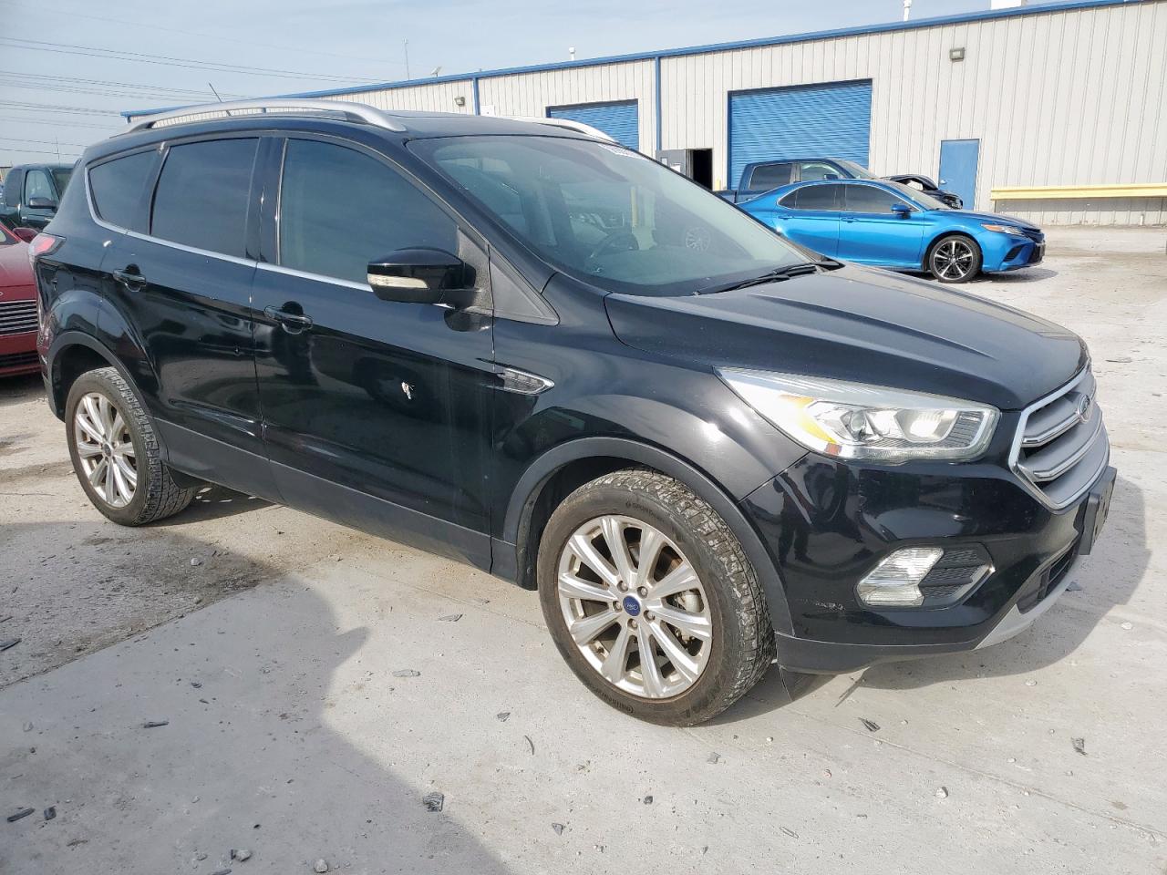 2017 Ford Escape Titanium VIN: 1FMCU0JD9HUB06238 Lot: 56900025