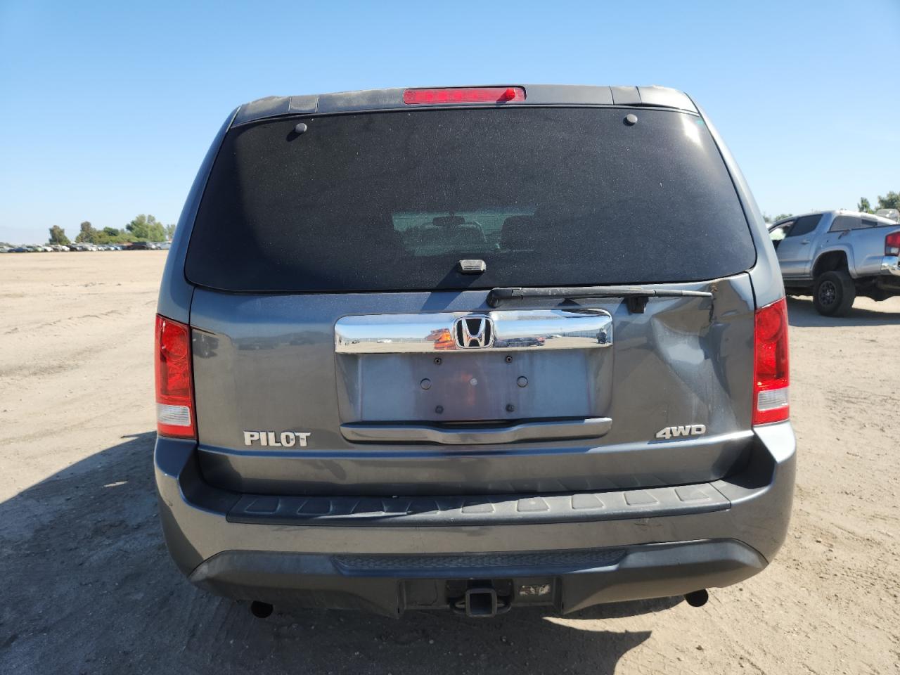 2012 Honda Pilot Lx VIN: 5FNYF4H27CB075489 Lot: 58254775